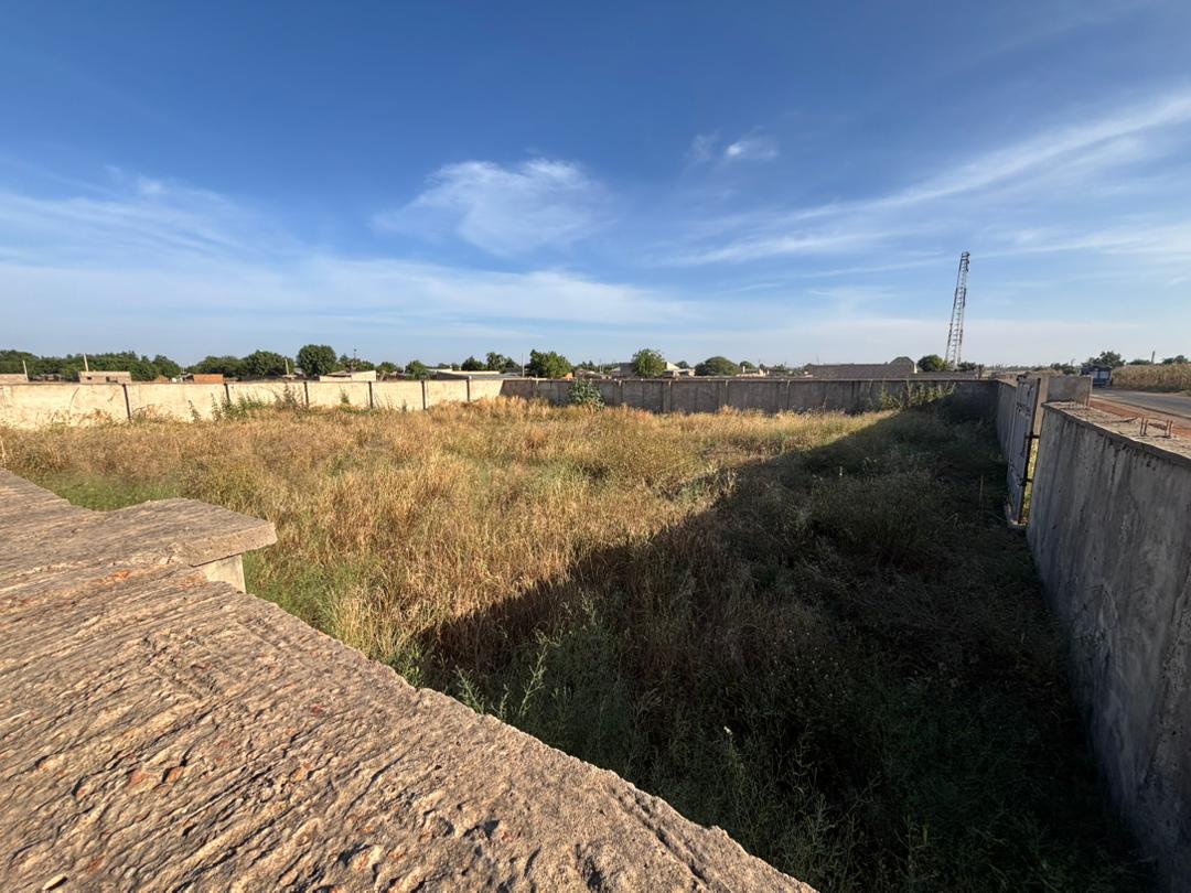 Fenced plot of land for sale